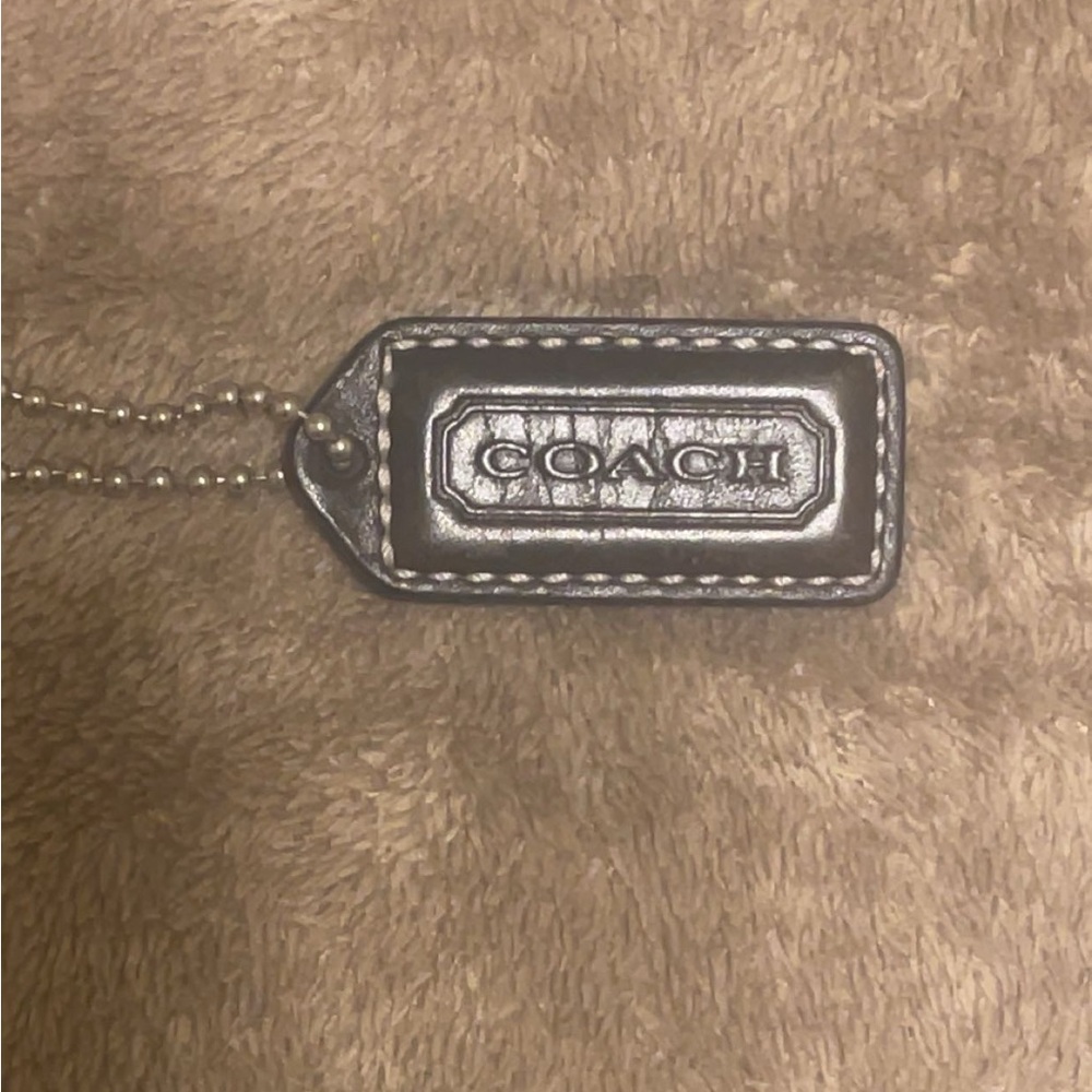 Small Coach Brown leather hangtag